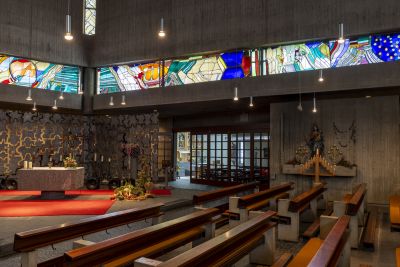 The new Catholic church in Herne-Röhlinghausen - Interior view, right: entrance to the side chapel with the former high altar, 2023